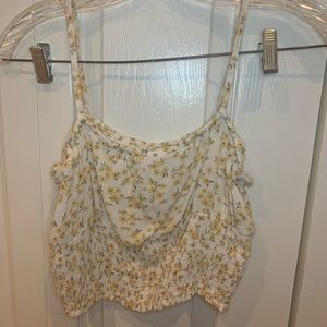 white crop top with yellow floral pattern